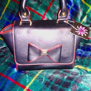 Black bow purse with outlined red trim NWT